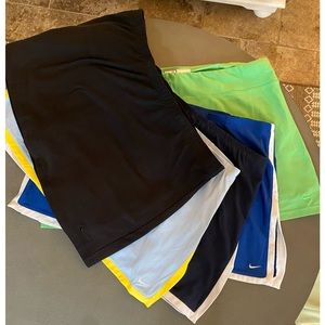 Nike women’s tennis/golf skirts with shorts. XL multi colors